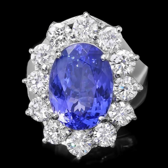 14k Gold 5.50ct Tanzanite 2.30ct Diamond Ring: Retail: $21,400.00 ****** 14k Gold 5.50ct Tanzanite 2.30ct Diamond Ring ****** Metal: 14k Solid White Gold / Size: 7.5 / Total Item Weight: 7 grams / Country Made: United States / / Main Stone: Tanzan