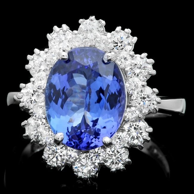 14k Gold 4.00ct Tanzanite 1.30ct Diamond Ring: Retail: $18,670.00 ****** 14k Gold 4.00ct Tanzanite 1.30ct Diamond Ring ****** Metal: 14k Solid White Gold / Size: 6.75 / Total Item Weight: 5.5 grams / Country Made: United States / / Main Stone: Tan