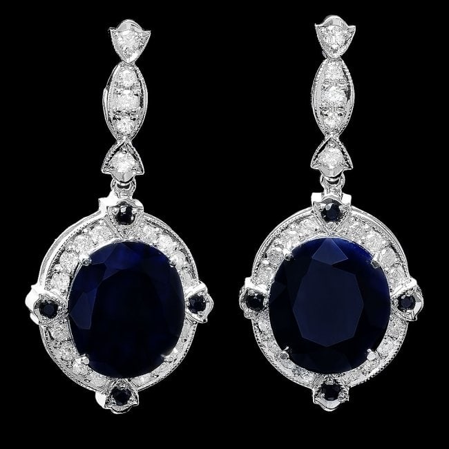 14k Gold 20ct Sapphire 1.10ct Diamond Earrings: Retail: $14,900.00 ****** 14k Gold 20ct Sapphire 1.10ct Diamond Earrings ****** Metal: 14k Solid White Gold / Total Item Weight: 13.5 grams / Country Made: United States / / Main Stone: Sapphire / Col