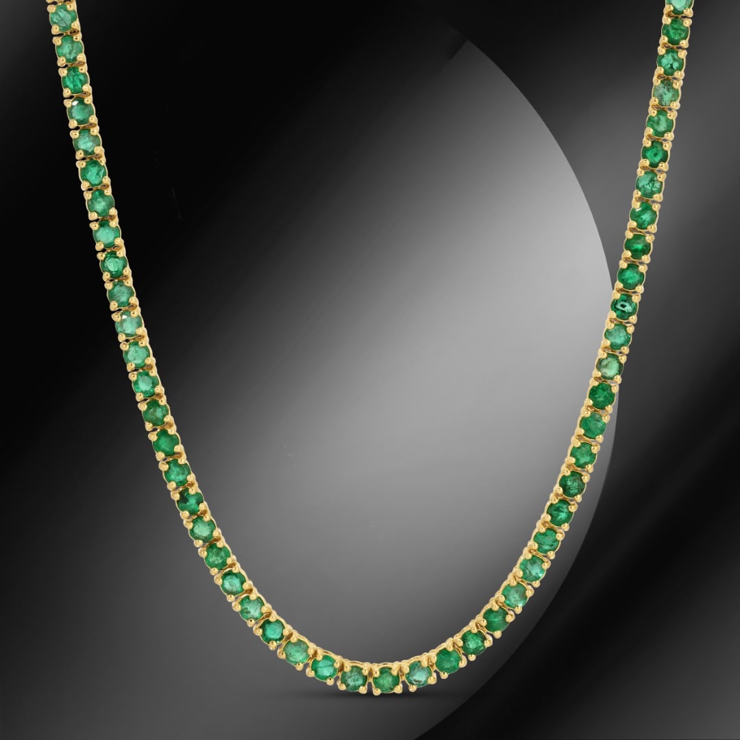 14K Gold 7.84cts Emerald Necklace: Retail: $18,137*****14K Gold Emerald Necklace*****Metal: 14K Yellow Gold/ Total Wt.: 16.2g / Country Made US// Main Stone: Emerald / Carat Total Wt.: 7.84cts / Treatment: none / Color: Green / Cut: Go