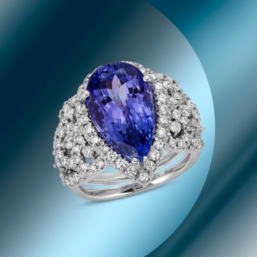 14K Gold 6.74cts Tanzanite & 1.67cts Diamond Ring: Retail: $21,746***** 14K Gold 6.74cts Tanzanite & 1.67cts Diamond Ring****** Metal: 14K White Gold/ Total Wt.: 9.8g/ Country Made USA// Main Stone: Tanzanite/ Carat Total Wt: 6.74cts / Treatment: