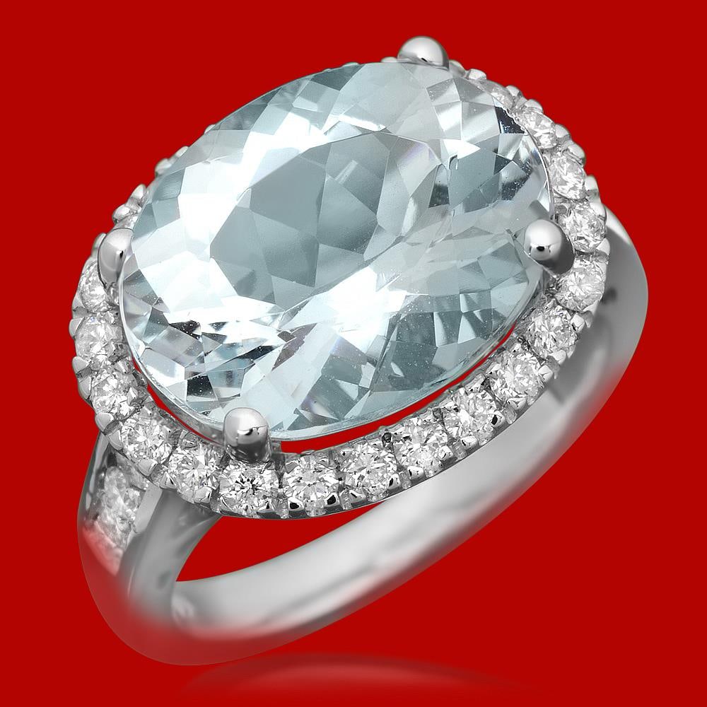 14k Gold 7.34ct Aquamarine 0.85ct Diamond Ring: Retail: $7,200.00 ****** 14k Gold 7.34ct Aquamarine 0.85ct Diamond Ring ****** Metal: 14k Solid White Gold / Size: 7 / Total Item Weight: 7.6 grams / Country Made: United States / / Main Stone: