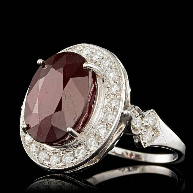 14k White Gold 12.50ct Ruby 1.90ct Diamond Ring: Retail: $19,100.00 ****** 14k White Gold 12.50ct Ruby 1.90ct Diamond Ring ****** Metal: 14k Solid White Gold / Size: 7 / Total Item Weight: 9.7 grams / Country Made: United States / / Main Stone: Ruby
