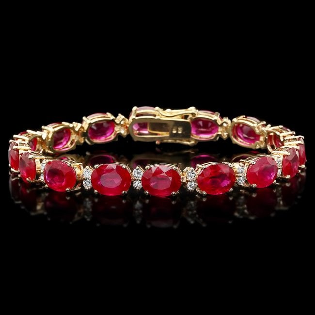14k Gold 36.23ct Ruby 1.50ct Diamond Bracelet: Retail: $18,750.00 ****** 14k Gold 36.23ct Ruby 1.50ct Diamond Bracelet ****** Metal: 14k Solid Yellow Gold / Size: 7.5 / Total Item Weight: 21.1 grams / Country Made: United States / / Main Stone: Ru
