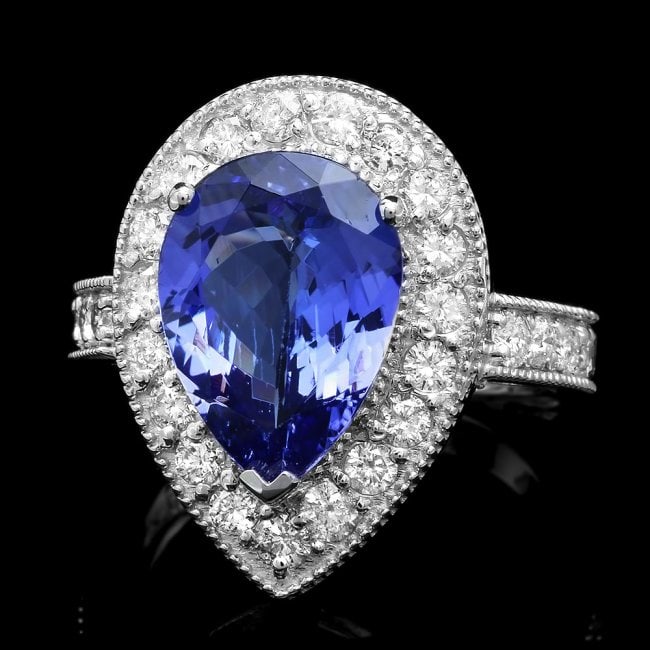 14k Gold 4.00ct Tanzanite 1.15ct Diamond Ring: Retail: $11,700.00 ****** 14k Gold 4.00ct Tanzanite 1.15ct Diamond Ring ****** Metal: 14k Solid White Gold / Size: 7 / Total Item Weight: 6.5 grams / Country Made: United States / / Main Stone: Tanzan