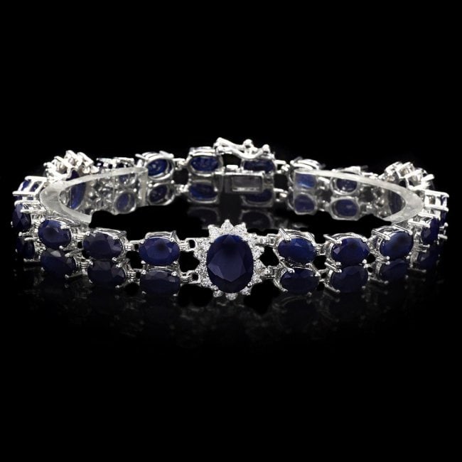 14k Gold 40ct Sapphire 1.50ct Diamond Bracelet: Retail: $21,500.00 ****** 14k Gold 40ct Sapphire 1.50ct Diamond Bracelet ****** Metal: 14k Solid White Gold / Size: 7.5 / Total Item Weight: 26.5 grams / Country Made: United States / / Main Stone: