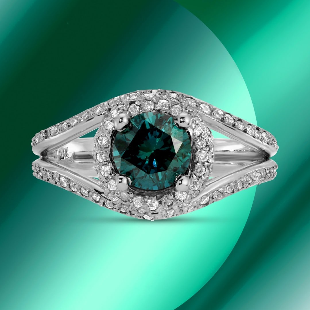 14K Gold 1.65cts Diamond Ring: Retail: $16,450*****14K Gold Diamond Ring*****Metal: 14K White Gold/ Total Wt.: 4.6g / Country Made US// Main Stone: Natural Diamonds / Carat Total Wt.: 1.07cts / Treatment: Color Enhanced / Color: no