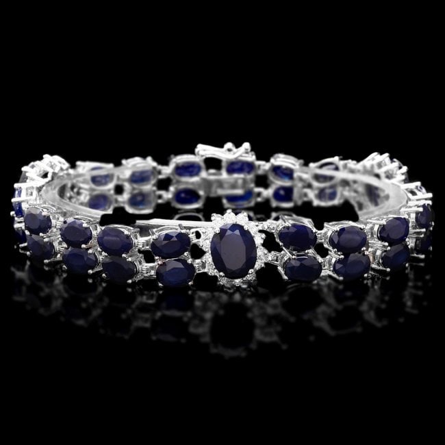 14k Gold 38ct Sapphire 1.45ct Diamond Bracelet: Retail: $19,800.00 ****** 14k Gold 38ct Sapphire 1.45ct Diamond Bracelet ****** Metal: 14k Solid White Gold / Size: 7.5 / Total Item Weight: 26.5 grams / Country Made: United States / / Main Stone: Sa