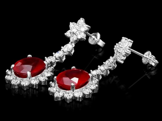 14k Gold 9.00ct Ruby 3.00ct Diamond Earrings: Retail: $14,750.00 ****** 14k Gold 9.00ct Ruby 3.00ct Diamond Earrings ****** Metal: 14k Solid White Gold / Total Item Weight: 8.0 grams / Country Made: United States / / Main Stone: Ruby / Color: Red
