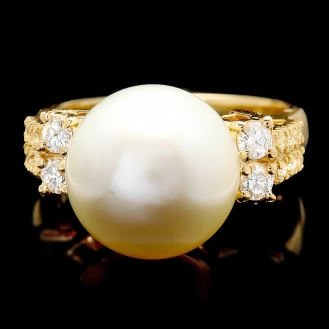 14k Yellow Gold 13mm Pearl 0.60ct Diamond Ring: Retail: $7,500.00 ****** 14k Yellow Gold 13mm Pearl 0.60ct Diamond Ring ****** Metal: 14k Solid Yellow Gold / Size: 7 / Total Item Weight: 8.0 grams / Country Made: United States / / Main Stone: Pearl
