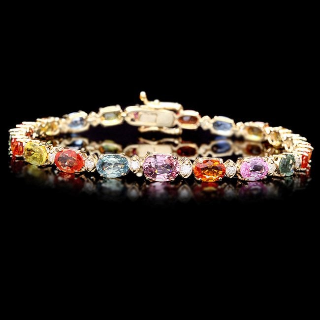 14k Gold 14ct Sapphire 0.50ct Diamond Bracelet: Retail: $9,500.00 ****** 14k Gold 14ct Sapphire 0.50ct Diamond Bracelet ****** Metal: 14k Solid Yellow Gold / Size: 7.5 / Total Item Weight: 10.0 grams / Country Made: United States / / Main Stone: Sa