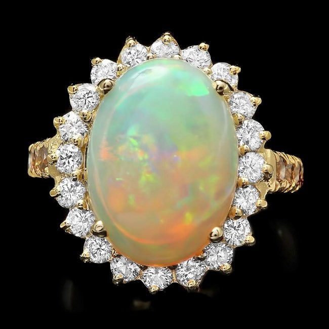 14k Yellow Gold 5.00ct Opal 1.35ct Diamond Ring: Retail: $9,800.00 ****** 14k Yellow Gold 5.00ct Opal 1.35ct Diamond Ring ****** Metal: 14k Solid Yellow Gold / Size: 7.5 / Total Item Weight: 7 grams / Country Made: United States / / Main Stone: Opal