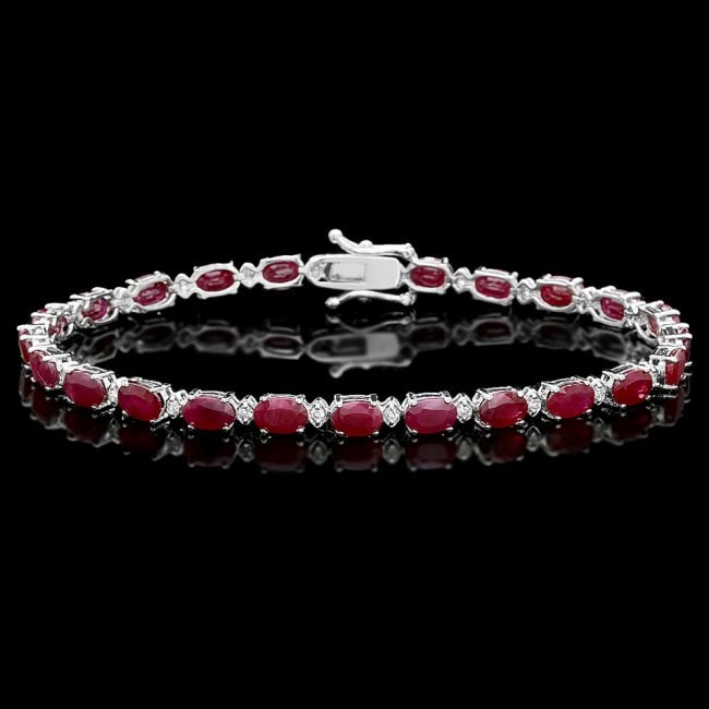 14k Gold 14.50ct Ruby 0.55ct Diamond Bracelet: Retail: $9,400.00 ****** 14k Gold 14.50ct Ruby 0.55ct Diamond Bracelet ****** Metal: 14k Solid White Gold / Size: 8 / Total Item Weight: 10.5 grams / Country Made: United States / / Main Stone: Ruby /