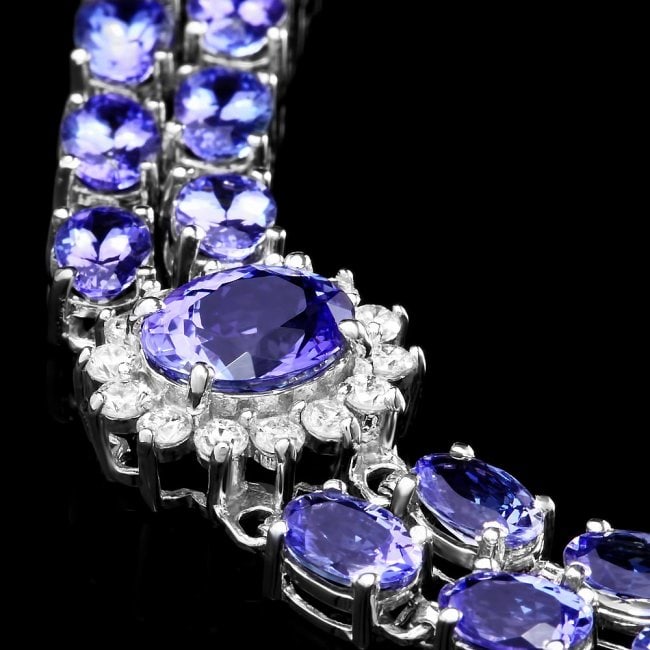 14k 21.88ct Tanzanite 1.66ct Diamond Bracelet: Retail: $18,500.00 ****** 14k 21.88ct Tanzanite 1.66ct Diamond Bracelet ****** Metal: 14k Solid White Gold / Size: 7 / Total Item Weight: 20.9 grams / Country Made: United States / / Main Stone: Tanza
