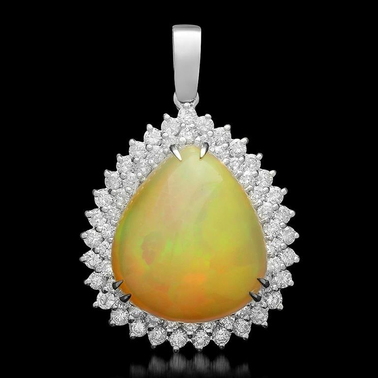 14K Gold 14.86ct Opal 2.35ct Diamond Pendant: Retail: $21,480.00 ****** 14K Gold Opal & Diamond Pendant ****** Metal: 14K Solid White Gold / Total Item Weight: 11.4 / Country Made: United States / / Main Stone: Opal / Color: Light Orange / Carat