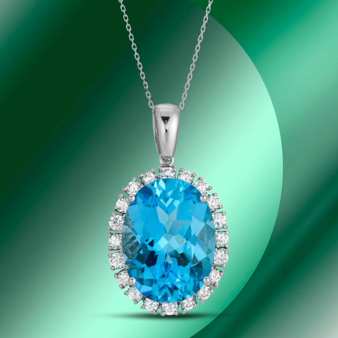 14K Gold 20.80cts Blue Topaz & 1.42cts Diamond Pendant: Retail: $9,165***** 14K Gold 20.80cts Blue Topaz & 1.42cts Diamond Pendant****** Metal: 14K White Gold/ Total Wt.: 10.2g/ Country Made USA// Main Stone: Topaz / Carat Total Wt: 20.80cts / Treatment: H