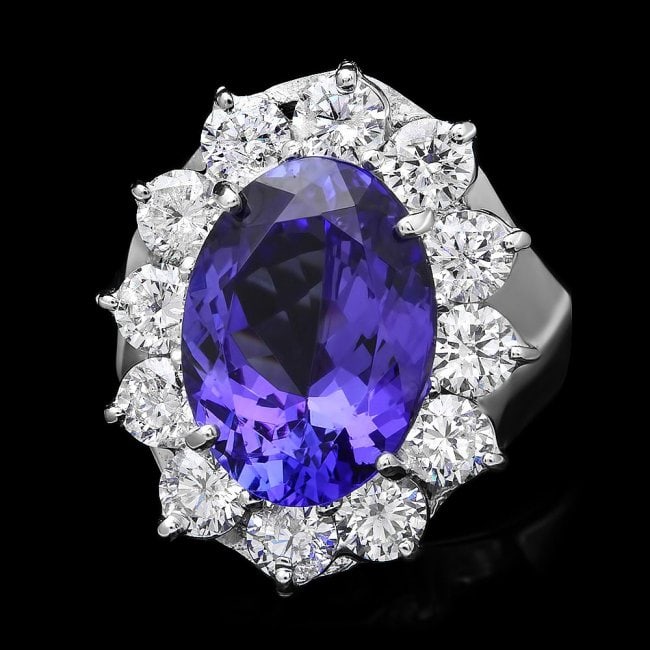 18k White Gold 5.20ct Tanzanite 2ct Diamond Ring: Retail: $21,500.00 ****** 18k White Gold 5.20ct Tanzanite 2ct Diamond Ring ****** Metal: 18k Solid White Gold / Size: 7.5 / Total Item Weight: 8 grams / Country Made: United States / / Main Stone: Tan
