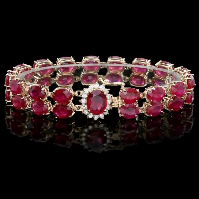 14k Yellow Gold 58ct Ruby 0.65ct Diamond Bracelet: Retail: $18,500.00 ****** 14k Yellow Gold 58ct Ruby 0.65ct Diamond Bracelet ****** Metal: 14k Solid Yellow Gold / Size: 7.5 / Total Item Weight: 29.0 grams / Country Made: United States / / Main Stone