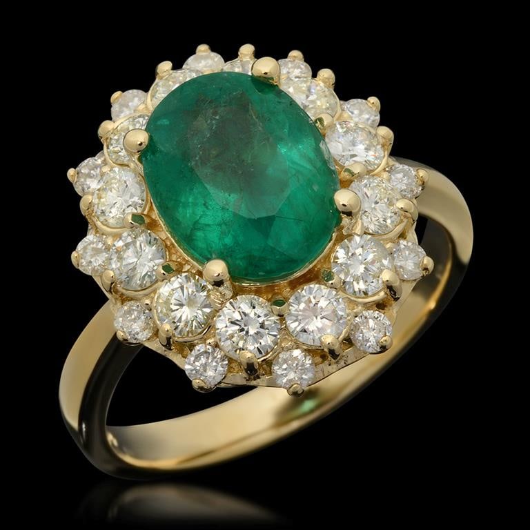14K Gold 2.77ct Emerald & 1.37ct Diamond Ring: Retail: $11,130.00******14K Gold Emerald & Diamond Ring ****** Metal: 14K Solid White Gold / Total Item Weight: 6.1 grams/ Country Made: United States / / Main Stone: Emerald / Color: Green / Carat To