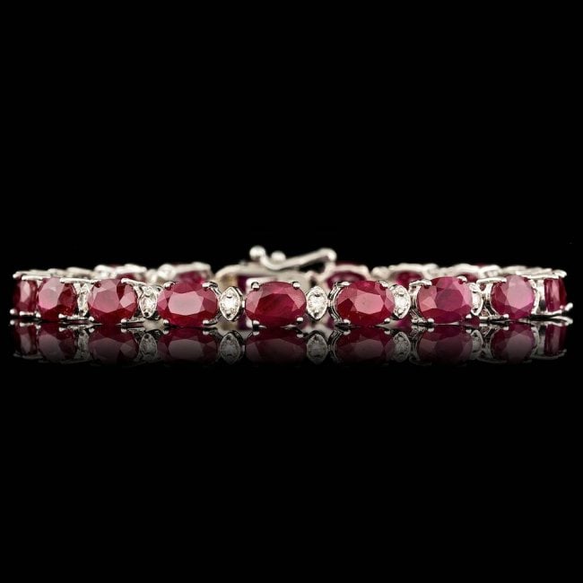 14k Gold 17.50ct Ruby 0.70ct Diamond Bracelet: Retail: $11,700.00 ****** 14k Gold 17.50ct Ruby 0.70ct Diamond Bracelet ****** Metal: 14k Solid White Gold / Size: 7 / Total Item Weight: 11.5 grams / Country Made: United States / / Main Stone: Ruby
