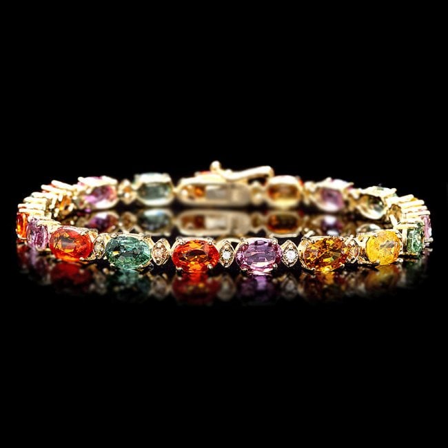 14k Gold 15ct Sapphire .60ct Diamond Bracelet: Retail: $12,580.00 ****** 14k Gold 15ct Sapphire .60ct Diamond Bracelet ****** Metal: 14k Solid Yellow Gold / Size: 7.5 / Total Item Weight: 11.0 grams / Country Made: United States / / Main Stone: Sa