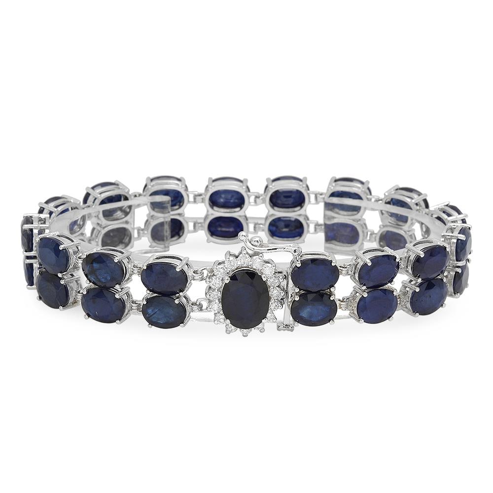 14K Gold 52.06ct Sapphire 0.63ct Diamond Bracelet: Retail: $18,728.00 ****** 14K Gold 52.06ct Sapphire 0.63ct Diamond Bracelet ****** Metal: 14K Solid Gold / Total Item Weight: 26.6 grams / Country Made: United States / / Main Stone: Sapphire / Color: