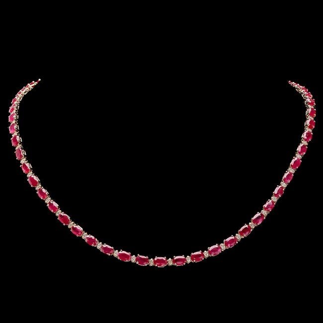 14k Gold 25.00ct Ruby 1.20ct Diamond Necklace: Retail: $16,800.00 ****** 14k Gold 25.00ct Ruby 1.20ct Diamond Necklace ****** Metal: 14k Solid Yellow Gold / Size: 17 / Total Item Weight: 20 grams / Country Made: United States / / Main Stone: Ruby