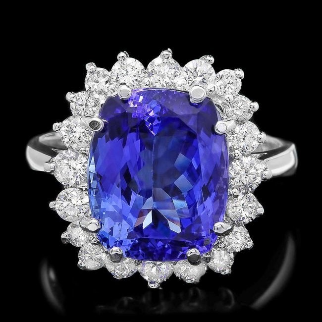 14k Gold 6.00ct Tanzanite 0.90ct Diamond Ring: Retail: $14,300.00 ****** 14k Gold 6.00ct Tanzanite 0.90ct Diamond Ring ****** Metal: 14k Solid White Gold / Size: 7.25 / Total Item Weight: 6.00 grams / Country Made: United States / / Main Stone: Ta