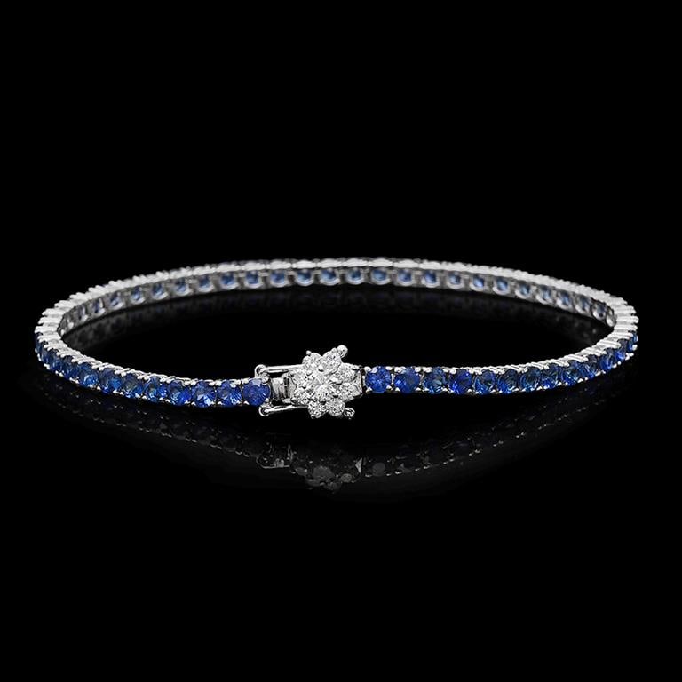 14K Gold 7.00ct Sapphire 0.55ct Diamond Bracelet: Retail: $6,635.00****** 14K Gold Sapphire & Diamond Bracelet ****** Metal: 14K Solid White Gold / Total Item Weight: 9.9 / Country Made: United States / / Main Stone: Sapphire / Color: Blue / Carat To