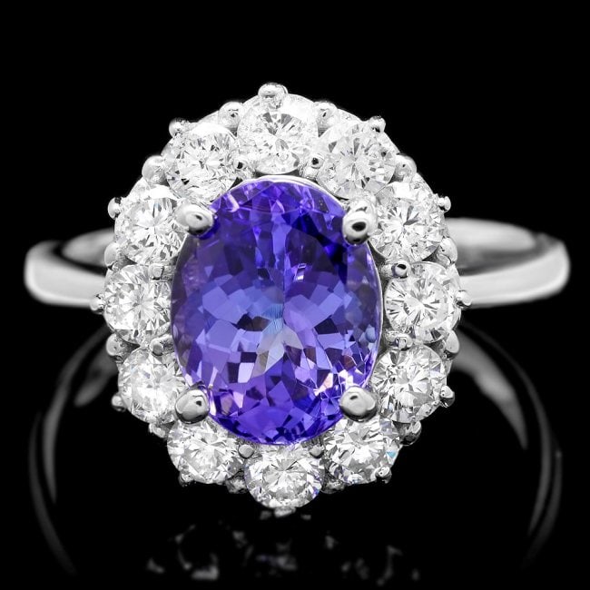 14k Gold 3.25ct Tanzanite 1.20ct Diamond Ring: Retail: $12,400.00 ****** 14k Gold 3.25ct Tanzanite 1.20ct Diamond Ring ****** Metal: 14k Solid White Gold / Size: 7.5 / Total Item Weight: 5.0 grams / Country Made: United States / / Main Stone: Tanz