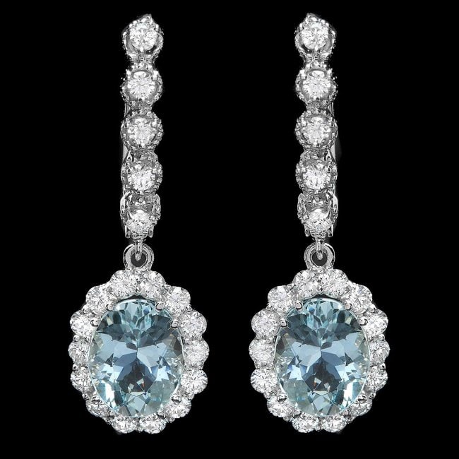 14k Gold 4ct Aquamarine 1.00ct Diamond Earrings: Retail: $9,980.00 ****** 14k Gold 4ct Aquamarine 1.00ct Diamond Earrings ****** Metal: 14k Solid White Gold / Total Item Weight: 5.0 grams / Country Made: United States / / Main Stone: Aquamarine / Co