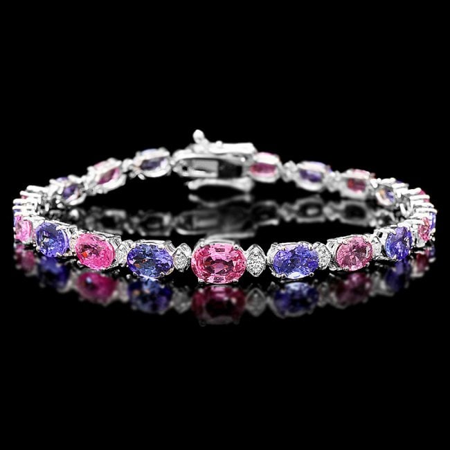 14K Gold 8ct Sapphire 0.65ct Diamond Bracelet: Retail: $12,890.00****** 14K Gold 8ct Sapphire 0.65ct Diamond Bracelet ****** Metal: 14k Solid White Gold / Total Item Weight: 10.5 grams / Country Made: United States / / Main Stone: Sapphire/ Color: