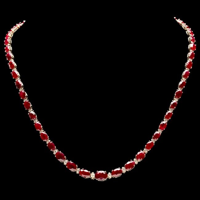 14k Gold 33.00ct Ruby 1.15ct Diamond Necklace: Retail: $20,100.00 ****** 14k Gold 33.00ct Ruby 1.15ct Diamond Necklace ****** Metal: 14k Solid Yellow Gold / Size: 17 / Total Item Weight: 21.0 grams / Country Made: United States / / Main Stone: Rub