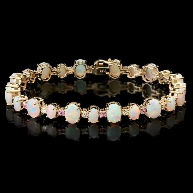 14k Gold 12.50ct Opal 0.85ct Diamond Bracelet: Retail: $14,600.00 ****** 14k Gold 12.50ct Opal 0.85ct Diamond Bracelet ****** Metal: 14k Solid Yellow Gold / Size: 7.75 / Total Item Weight: 18.5 grams / Country Made: United States / / Main Stone: O