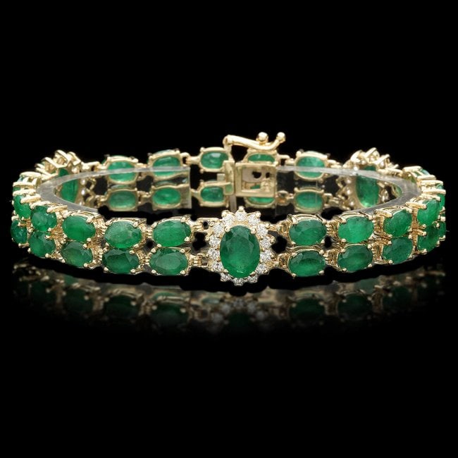 14k Gold 18ct Emerald 1.50ct Diamond Bracelet: Retail: $21,800.00 ****** 14k Gold 18ct Emerald 1.50ct Diamond Bracelet ****** Metal: 14k Solid Yellow Gold / Size: 7 / Total Item Weight: 17.5 grams / Country Made: United States / / Main Stone: Emer