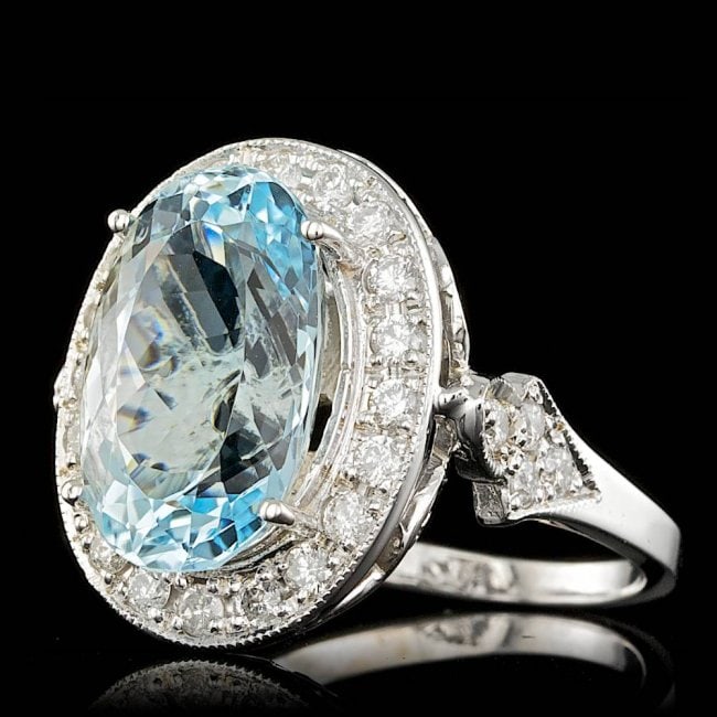 14k Gold 7.00ct Aquamarine 1.65ct Diamond Ring: Retail: $17,700.00 ****** 14k Gold 7.00ct Aquamarine 1.65ct Diamond Ring ****** Metal: 14k Solid White Gold / Size: 7.25 / Total Item Weight: 7.5 grams / Country Made: United States / / Main Stone: Aq