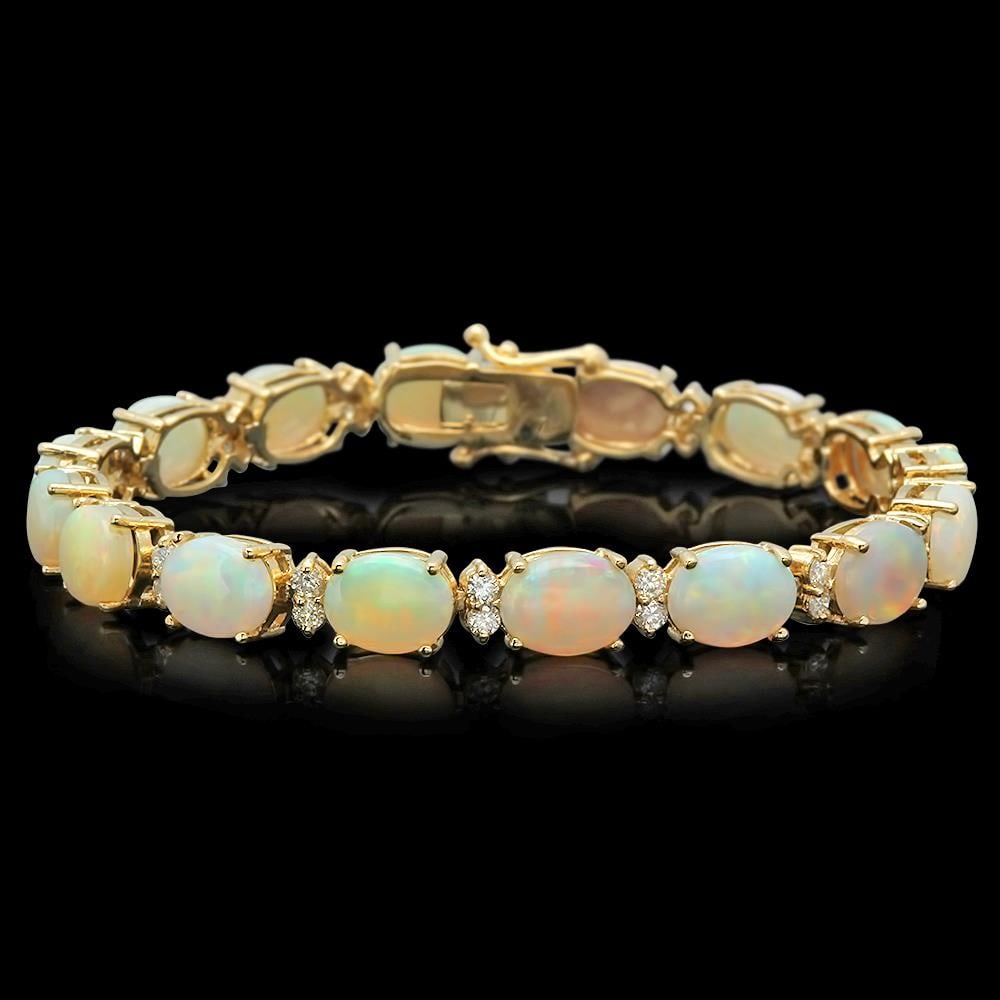 14K Gold 16.97ct Opal 1.45ct Diamond Bracelet: Retail: $14,890.00 ****** 14K Gold 16.97ct Opal 1.45ct Diamond Bracelet ****** Metal: 14K Solid Gold / Total Item Weight: 16.2 grams / Country Made: United States / / Main Stone: Opal / Color: Play of