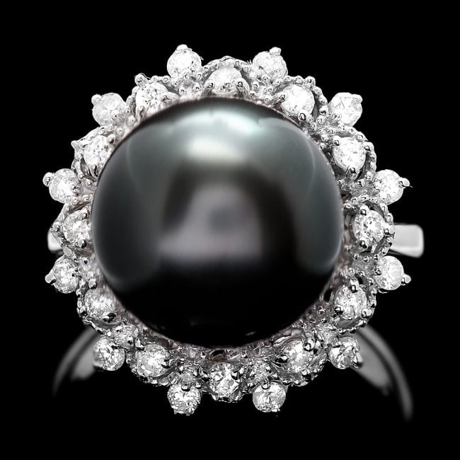 14k White Gold 12mm Pearl 0.50ct Diamond Ring: Retail: $7,600.00 ****** 14k White Gold 12mm Pearl 0.50ct Diamond Ring ****** Metal: 14k Solid White Gold / Size: 7 / Total Item Weight: 8.0 grams / Country Made: United States / / Main Stone: Pearl /
