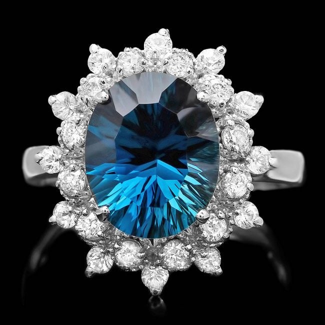 14k White Gold 4.20ct Topaz 0.75ct Diamond Ring: Retail: $4,800.00 ****** 14k White Gold 4.20ct Topaz 0.75ct Diamond Ring ****** Metal: 14k Solid White Gold / Size: 7.5 / Total Item Weight: 4.5 grams / Country Made: United States / / Main Stone: Top