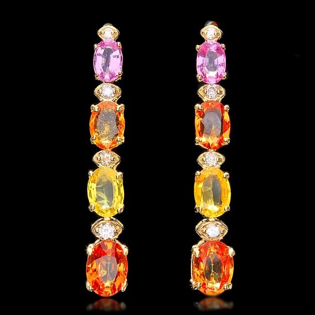 14k Gold 7ct Sapphire 0.40ct Diamond Earrings: Retail: $5,300.00 ****** 14k Gold 7ct Sapphire 0.40ct Diamond Earrings ****** Metal: 14k Solid Yellow Gold / Total Item Weight: 5.0 grams / Country Made: United States / / Main Stone: Sapphire / Color