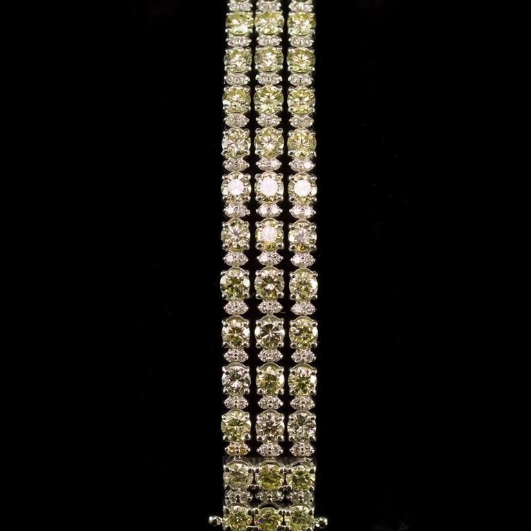 18K Gold 13.95ct Fancy Color Diamond 16.95ct Diamond Bracelet: Retail: $74,425.00 ******Fancy Color Diamond & Diamond Bracelet ****** Metal: 18k Solid White Gold / Total Item Weight: 28.4 grams / Country Made: United States / / Main Stone: Diamond / Carat Total W