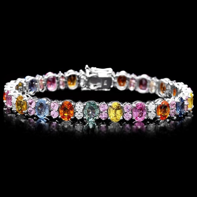 14k Gold 24ct Sapphire 1.25ct Diamond Bracelet: Retail: $20,500.00 ****** 14k Gold 24ct Sapphire 1.25ct Diamond Bracelet ****** Metal: 14k Solid White Gold / Size: 7 / Total Item Weight: 19.5 grams / Country Made: United States / / Main Stone: Sapp