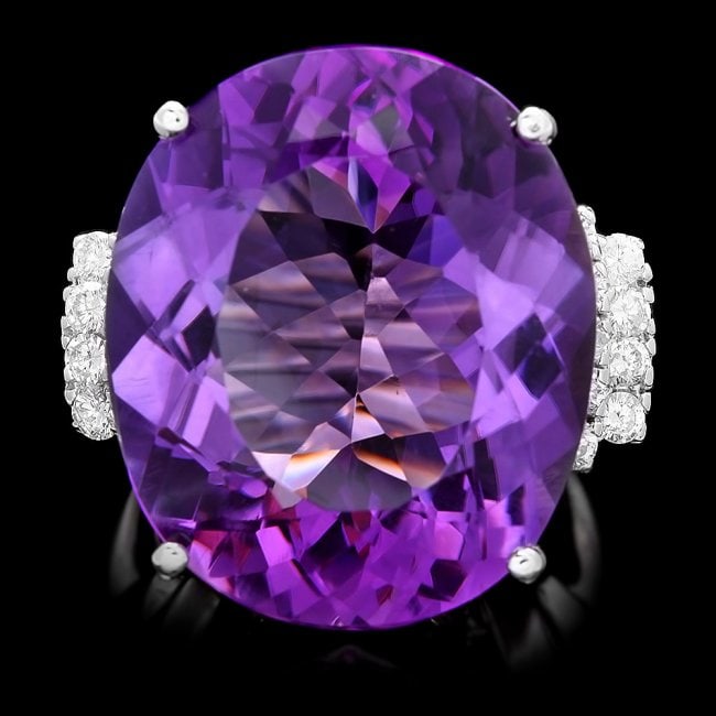 14k Gold 30.00ct Amethyst 0.75ct Diamond Ring: Retail: $12,400.00 ****** 14k Gold 30.00ct Amethyst 0.75ct Diamond Ring ****** Metal: 14k Solid White Gold / Size: 7 / Total Item Weight: 17.0 grams / Country Made: United States / / Main Stone: Ameth