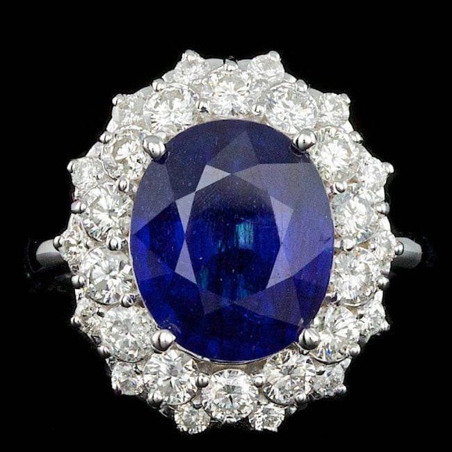 14k Gold 7.00ct Sapphire 1.75ct Diamond Ring: Retail: $11,700.00 ****** 14k Gold 7.00ct Sapphire 1.75ct Diamond Ring ****** Metal: 14k Solid White Gold / Size: 7.75 / Total Item Weight: 8.3 grams / Country Made: United States / / Main Stone: