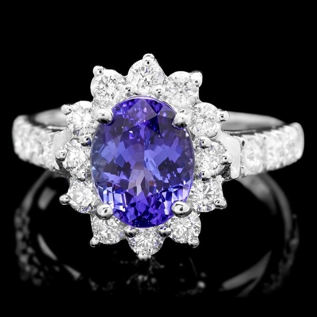 14k Gold 2.20ct Tanzanite 1.00ct Diamond Ring: Retail: $8,900.00 ****** 14k Gold 2.20ct Tanzanite 1.00ct Diamond Ring ****** Metal: 14k Solid White Gold / Size: 7 / Total Item Weight: 4.0 grams / Country Made: United States / / Main Stone: