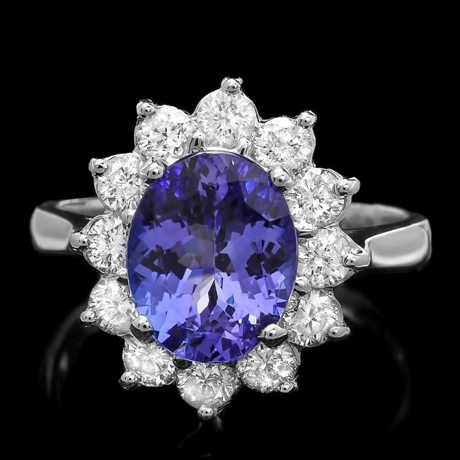 14k Gold 2.40ct Tanzanite 1.00ct Diamond Ring: Retail: $9,500.00 ****** 14k Gold 2.40ct Tanzanite 1.00ct Diamond Ring ****** Metal: 14k Solid White Gold / Size: 7 / Total Item Weight: 4.5 grams / Country Made: United States / / Main Stone: