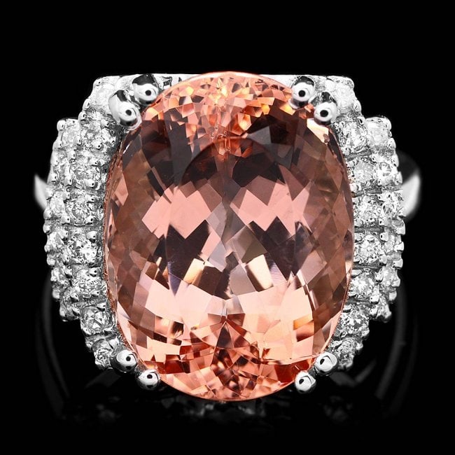 14K White Gold 10.50ct Morganite 0.45ct Diamond Ring: Retail: $9,800.00****** 14K White Gold 10.50ct Morganite 0.45ct Diamond Ring ****** Metal: 14k Solid White Gold / Size: 7 / Total Item Weight: 8.0 grams / Country Made: United States / / Main Stone: