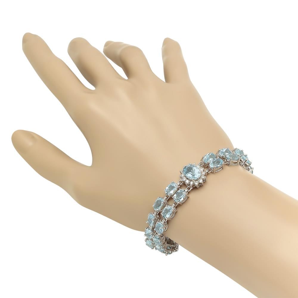 14K Gold 24.67ct Aquamarine 1.63ct Diamond Bracelet: Retail: $19,480.00 ****** 14K Gold 24.67ct Aquamarine 1.63ct Diamond Bracelet ****** Metal: 14K Solid Gold / Total Item Weight: 23.6 grams / Country Made: United States / / Main Stone: Aquamarine /