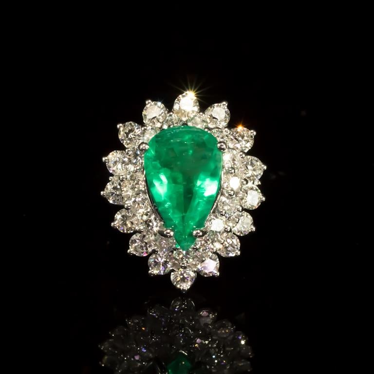 14K Gold 2.05ct Emerald 1.70ct Diamond Ring: Retail: $14,000.00 ****** 14K Gold Emerald & Diamond Ring ****** Metal: 14K Solid White Gold / Total Item Weight: 7.0 grams / Country Made: United States / / Main Stone: Emerald / Color: Green / Carat