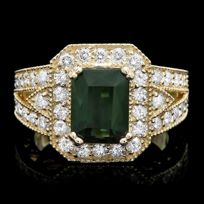 14k Gold 3.00ct Tourmaline 1.20ct Diamond Ring: Retail: $7,850.00 ****** 14k Gold 3.00ct Tourmaline 1.20ct Diamond Ring ****** Metal: 14k Solid Yellow Gold / Size: 6.5 / Total Item Weight: 7.5 grams / Country Made: United States / / Main Stone: Tou